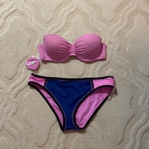 Women’s Victoria’s Secret color block bikini. Large bottoms. 36C top.